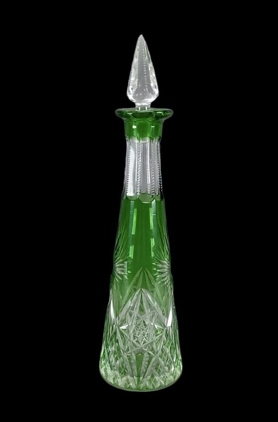 CUT CRYSTAL BACCARAT LIQUOR BOTTLE: Measures 10 inches tall. Estimate $800-1.000