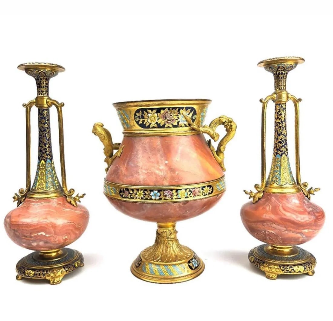 19TH C. FRENCH CHAMPLEVE AND MARBLE GARNITURE: Vases measure 20 cm high. In good condition. Estimate $2500-3000