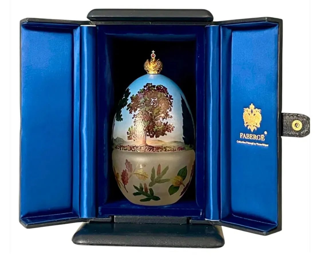 IMPERIAL FABERGE ENAMELLED GLASSES AND STERLING SILVER EGG: With FABERGE presentation box. In excellent condition. Estimate $3000-4000