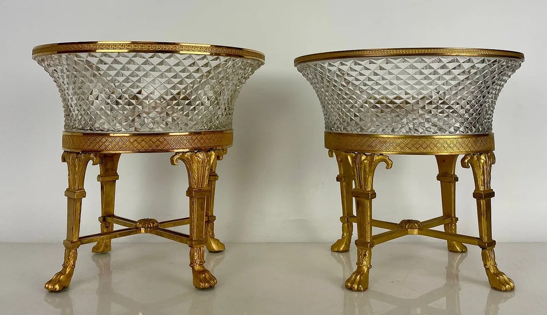 A PAIR OF ORMOLU MOUNTED BACCARAT CRYSTAL FOOTED BOWLS: Circa 1900. Measures 7 inches D., 8 inches h. In excellent condition. Estimate $2000-2500