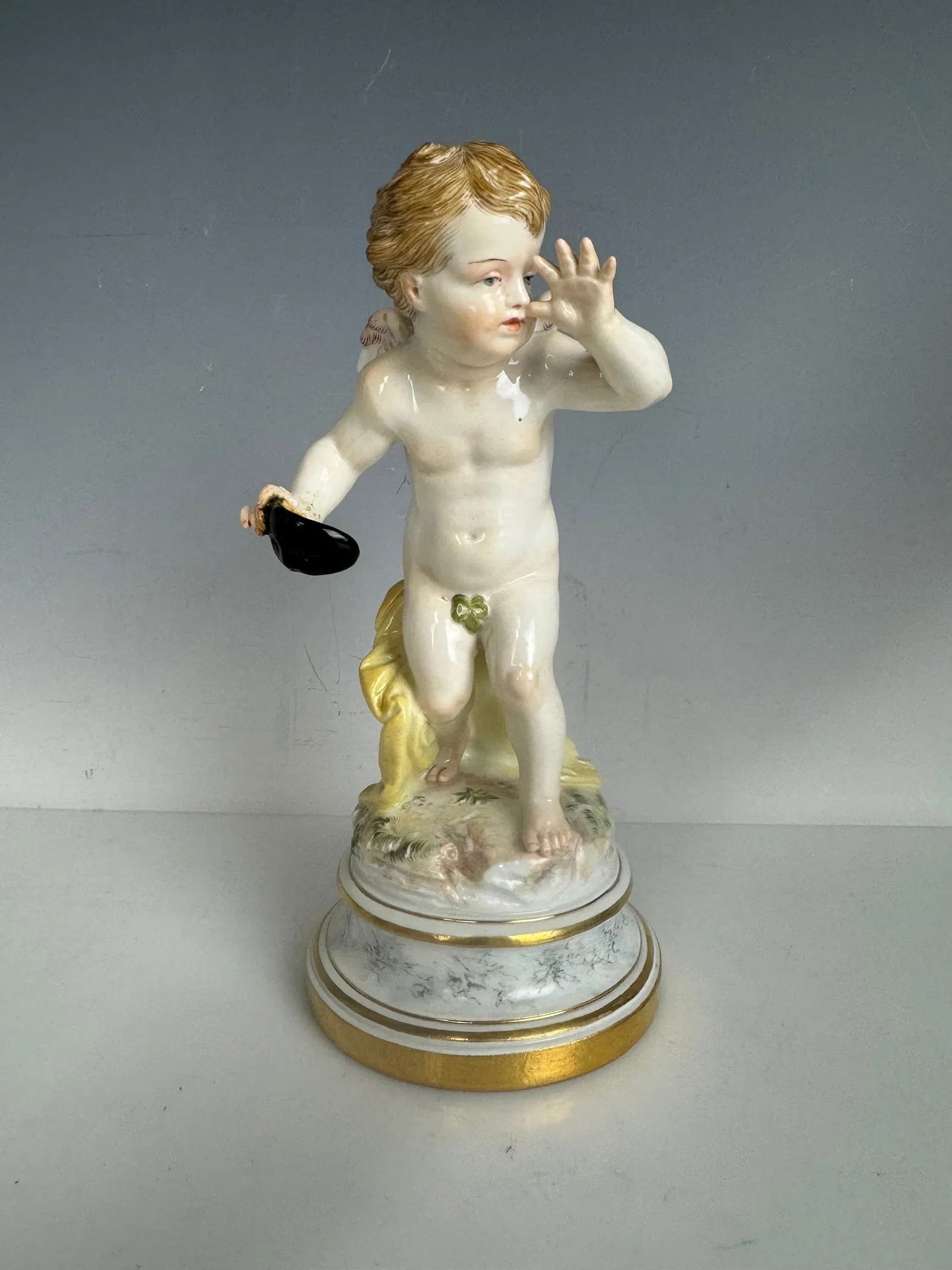 19Th c. MEISSEN CHERUB L SERIES: First quality. Measures 7 inches high. In overall good condition, minor restoration to one hand. Estimate $1000-1200