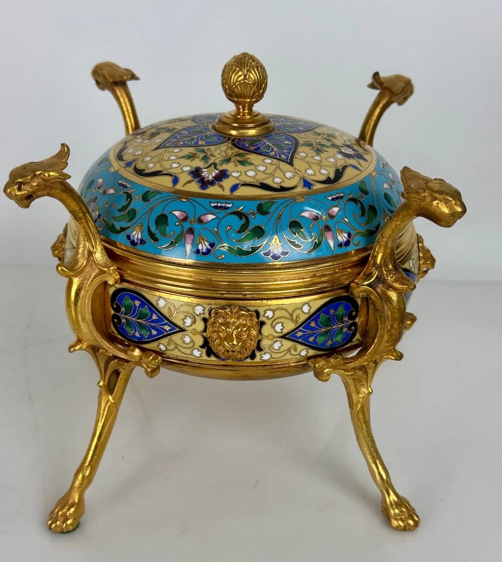 19TH C. FRENCH CHAMPLEVE ENAMEL,L JAR AND COVER: Measures 7.5 inches L., 6 inches h. In excellent condition. Estimate $1200-1500