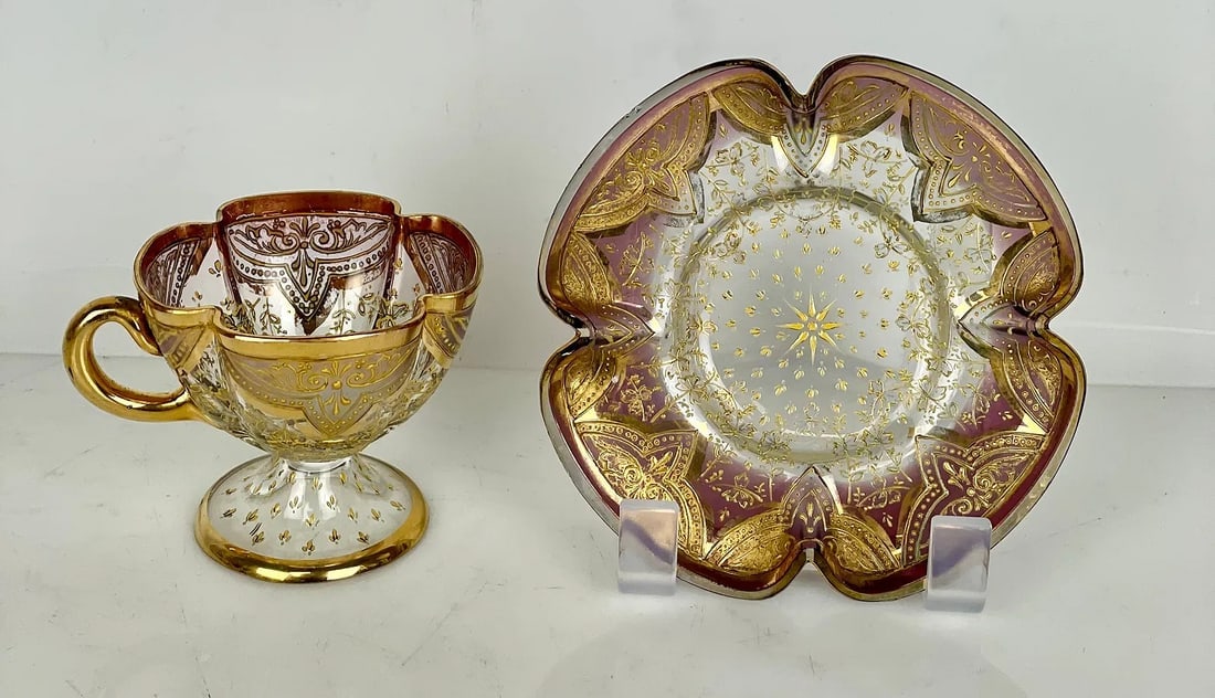 MOSER GILT MOSER CUP AND SAUCER: Circa 1900. In very good condition. Estimate $300-400