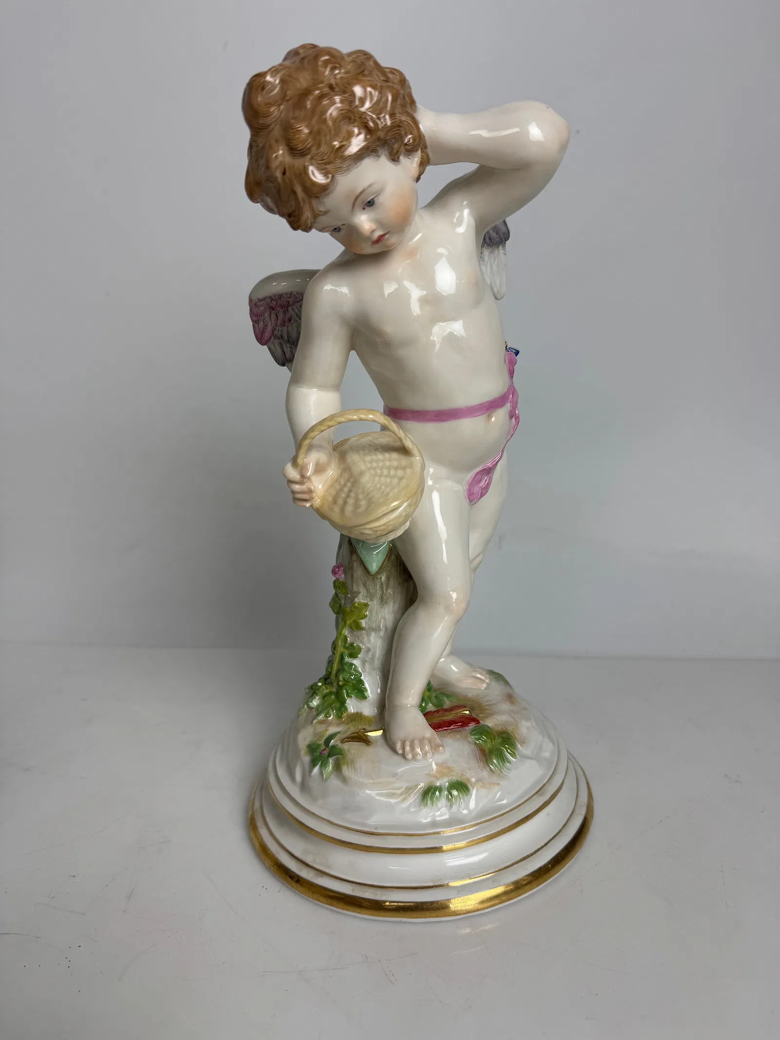A LARGE 19TH C. MEISSEN CHERUB: First quality cross swords mark. Measures 11 inches tall. In mint condition. Estimate $1500-2000