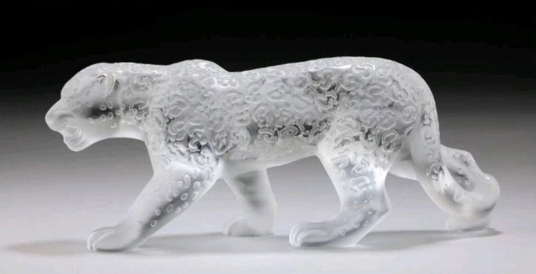 LALIQUE RAJA JAGUAR: Clear and frosted glass, signed Lalique France Dimensions:5-3/8 x 3-5/8 x 13-1/2 inches (13.7 x 9.2 x 34.3 cm)In excellent condition. Estimate 2000-2500