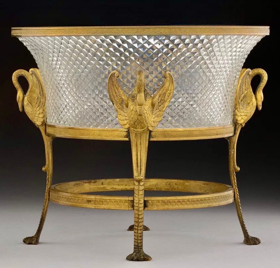 EMPIRE STYLE ORMOLU MOUNTED BACCARAT CENTERPIECE: Circa 1900. Measures 10” d. , 8.5” high. In good antique condition. Estimate $1200-1500