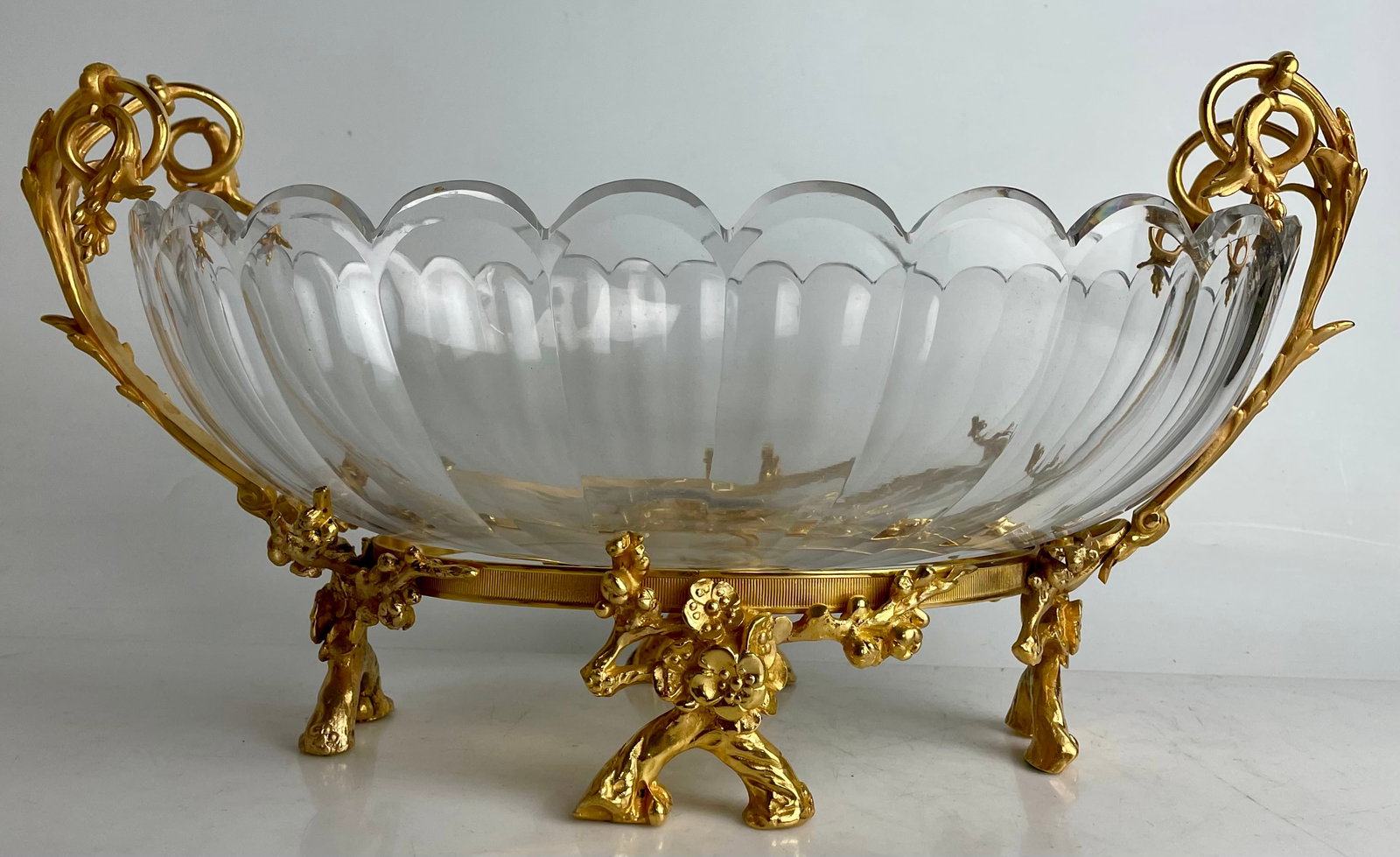 A LARGE ORMOLU MOUNTED BACCARAT CRYSTAL CENTERPIECE: Circa 1900. Measures 17.5”x10.5”x9” h. In good condition, no breaks, no cracks.StampedBaccarat. Estimate $2000-2500