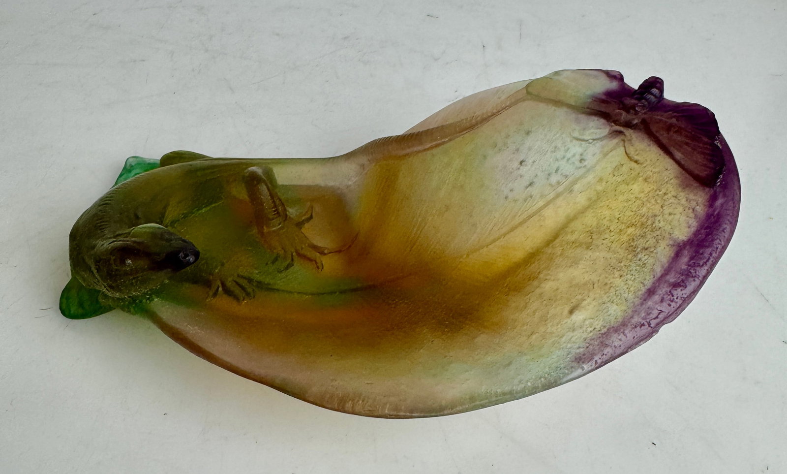 DAUM PATE DE VERRE DISH: Measures 7” l. I signed Daum France. In excellent condition. Estimate $600-800