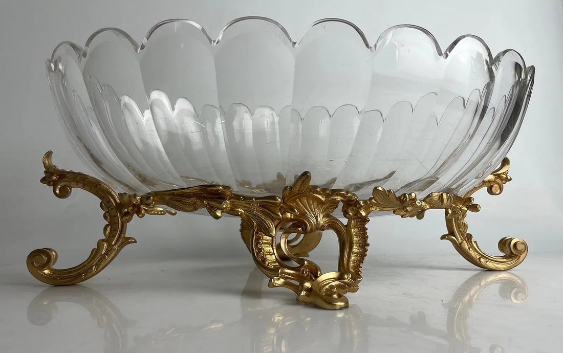 ORMOLU MOUNTED BACCARAT CRYSTAL CENTERPIECE: Circa 1900. Measures 16 inches x10.5 inches x6.8 inches h. In overall good condition, no chips, no breaks.Estimate $2000-2500