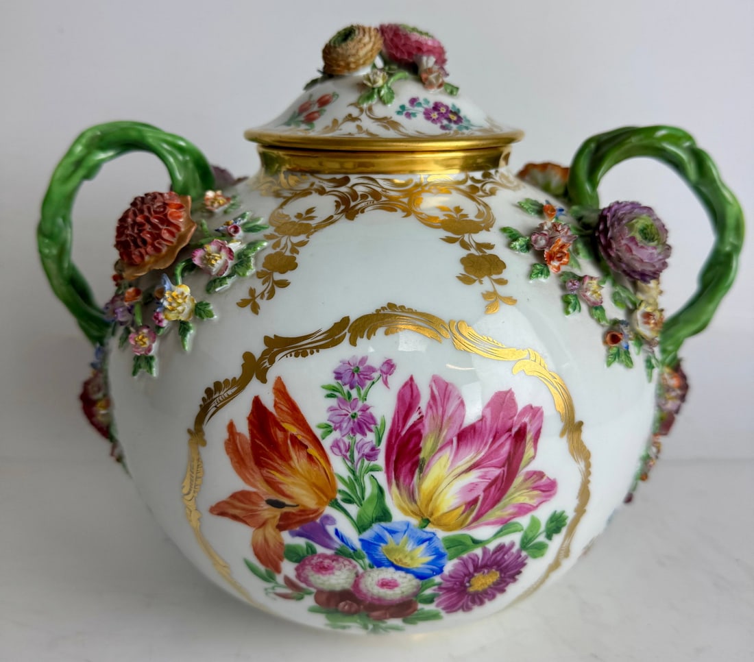 19TH C. MEISSEN JAR AND COVER: First quality. Measures 11 inches l., 9.5 inches h. In good antique condition. Minor lass of flower petals, consistent with age. Estimate $2500-3000