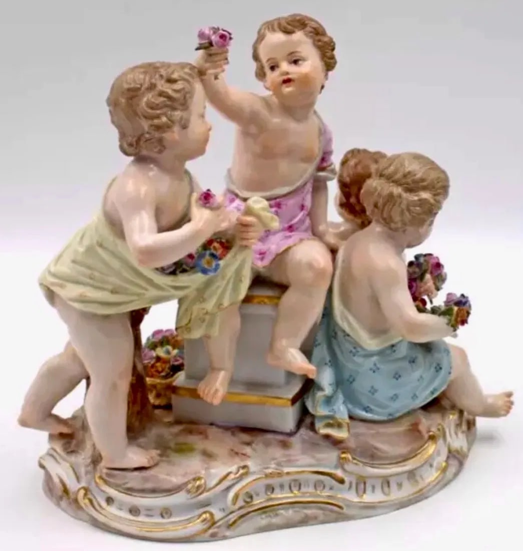 19TH C. MEISSEN GROUP: First quality ctpross swords mark. Measures 6 inchesmx5 inchesmx6.75 inchesm high. Estimate $1500-2000