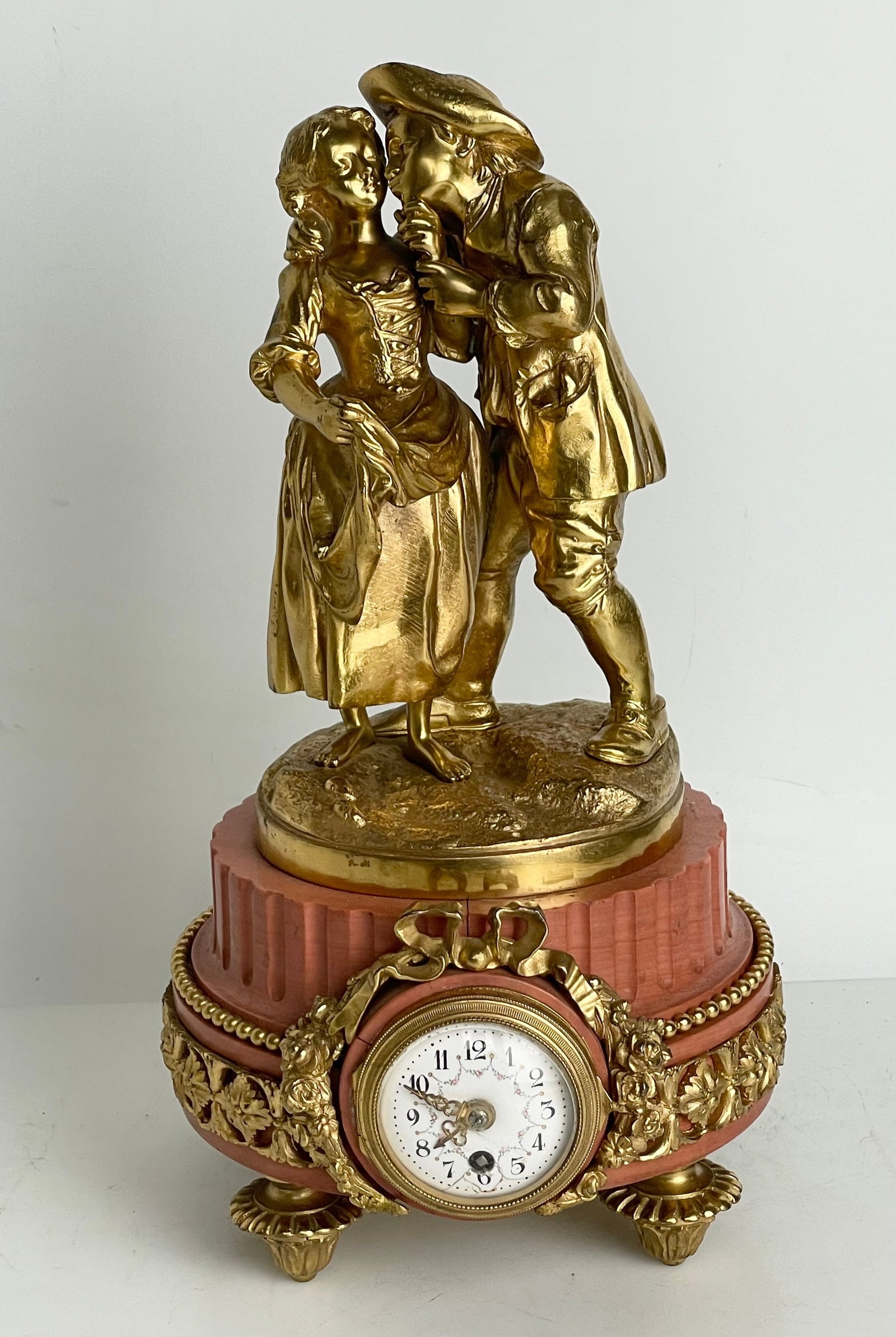 19TH C. FRENCH ORMOLU AND MARBLE CLOCK: Measures 12” h. In good condition, movement not tested. Estimate $800-1000