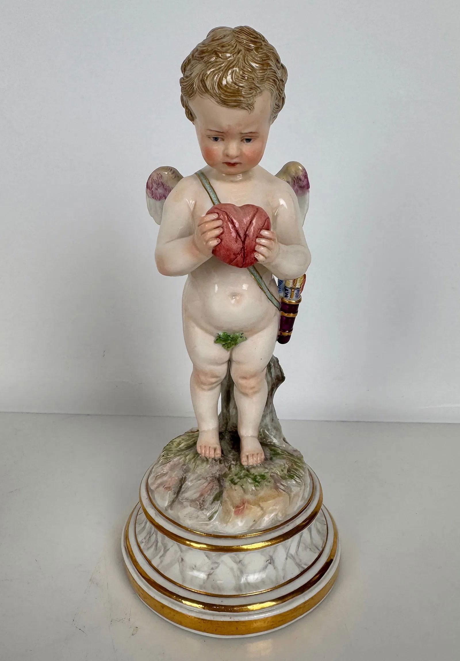 MEISSEN CHERUB L SERIES: Circa 1900. First quality mark. Measures 8 inches h. In excellent condition. Estimate $1000-1200
