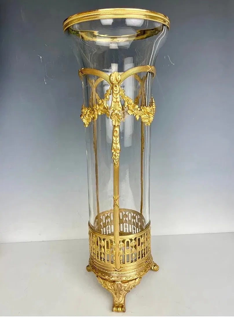 A LARGE ORMOLU MOUNTED BACCARAT GLASS VASE: Circa 1900. Measures. 16 inches tall x 5-7/8 inches wide at top, 5-1/2 inches at bottom (including feet)..In excellent condition. Estimate $1500-2000