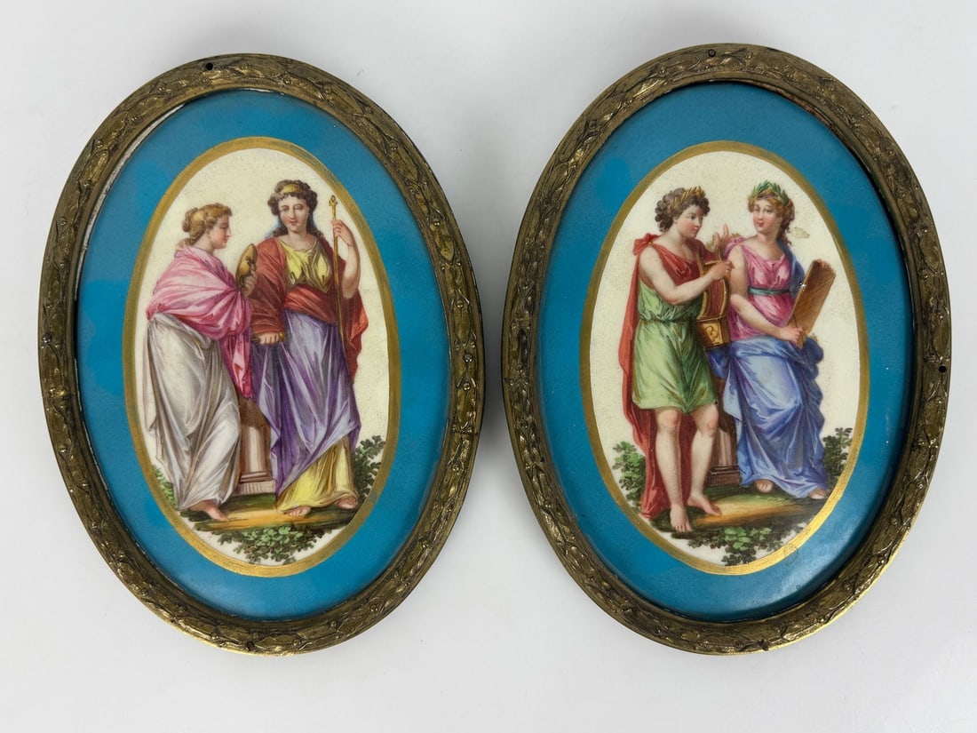 A PAIR OF SEVRES AND ORMOLU PLAQUES: Circa 1900. Measures 9 inches . In good condition. Estimate $800-$1000