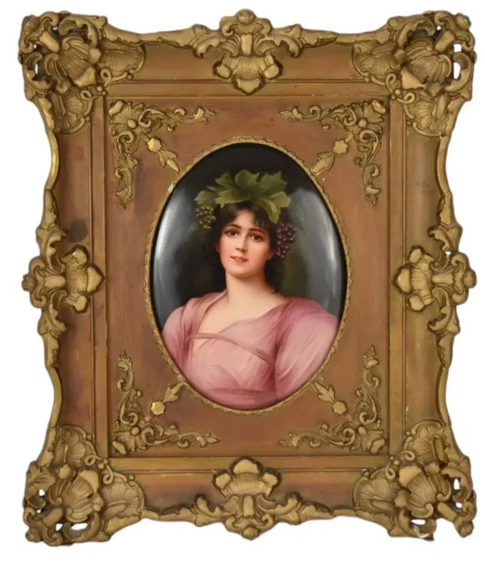 BERLIN KPM PORCELAIN PLAQUE: KPM Berlin Porcelain Plaque of "The Fair Hebe", C. Late 19th/20th Century - Finely painted oval plaque after Kaulbach with a bust-length portrait of a raven-haired beauty with grapes in her hair. The