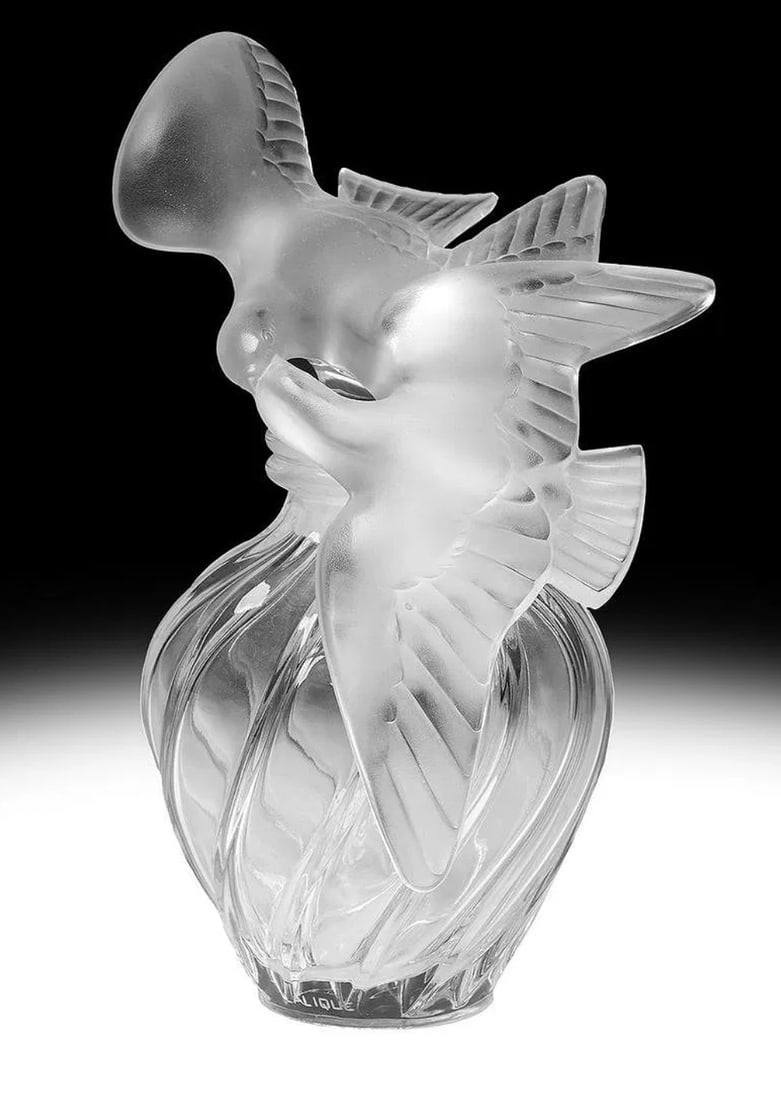 LARGE LALIQUE CRYSTAL 'KISSING DOVES' PERFUME BOTTLE 12": Large Lalique crystal perfume bottle. Frosted doves stopper and swirled-form body. Signed to side of base. Measures 12" (30.5cm) height.In excellent condition. Estimate $2000-2500