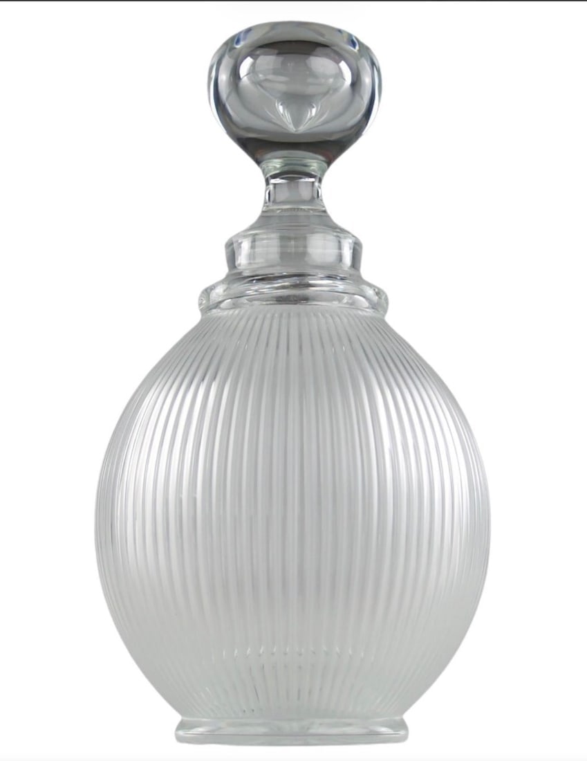 LALIQUE LANGEAIS DECANTER AND STOPPER: Decanter & Stopper measures 9.8” high. Signed Lalique. Excellent used condition. Estimate $800-1000