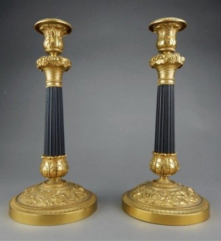 A PAIR OF BRONZE CANDEL HOLDERS (1 of 2)