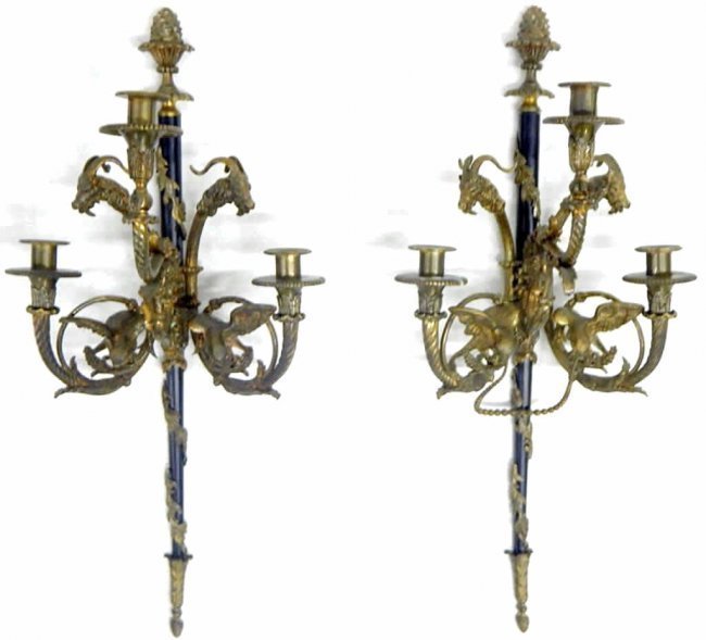 PAIR OF EMPIRE STYLE GILT BRONZE WALL SCONSES: Measures 25" x 11 1/2". Estimate $1.200-1.500