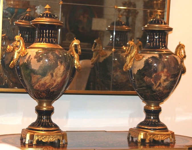 A LARGE PAIR OF ORMOLU MOUNTED SEVRES STYLE VASES (1 of 4)