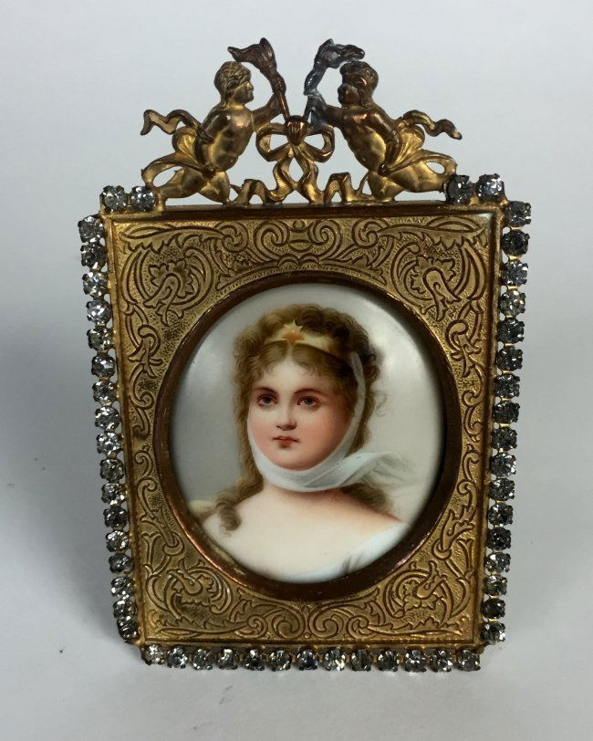 A MINIATURE PORCELAIN PLAQUE IN A GILT BRONZE FRAME (1 of 1)