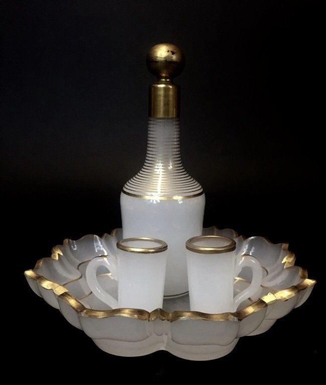 19TH CENTURY BACCARAT OPALINE GLASS LIQUOR SET: In excellent condition. Estimate $400-500
