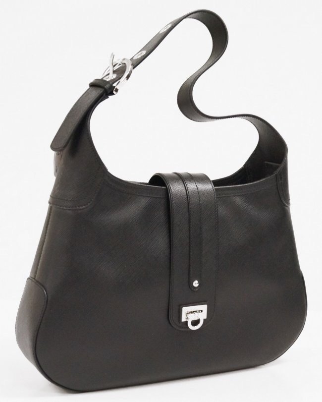 FERRAGAMO BLACK LEATHER HAND BAG: Condition : like new. Estimate $500-600