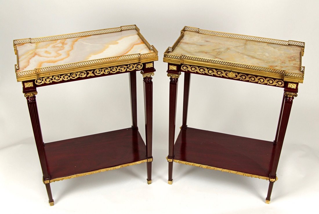 A PAIR OF DORE BRONZE MOUNTED ONYX TOP OCASIONAL TABLES: Circa 1900. Measures 32 1/2"h x 25" x 15". Excellent condition. Estimate $2.500-3.000