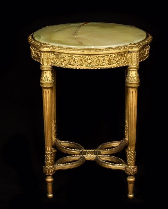 19TH CENTURY ONYX TOP GUILTWOOD GUERIDON: Height 29 1/2 x depth 24 inches Estimate $1.500-2.000
