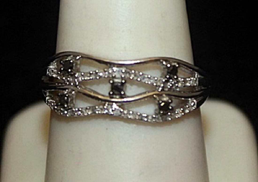 Lady's Fancy Silver Ring with Black & White Diamonds: Lady's Fancy Silver Ring with Black & White Diamonds (130I) twt approx. 1ct VS1 color E-F.