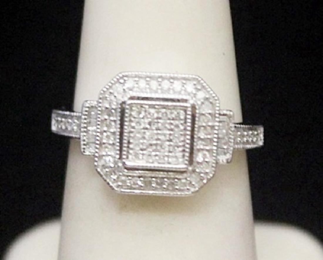Lady's Fancy Silver Ring with Diamonds (160I): Lady's Fancy Silver Ring with Diamonds (160I) twt approx. 1.05cts VS1-2 color G-L.