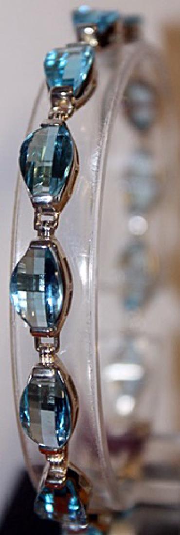 Gorgeous Royal Blue Topaz Bracelet: Royal blue topaz bracelet, 50 ct. Silver.