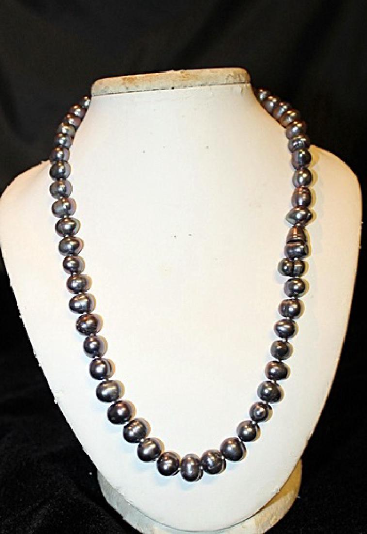 Baroque Dark Grey Color Pearl Necklace: 18 inch single strand Dark Grey color baroque pearl necklace.