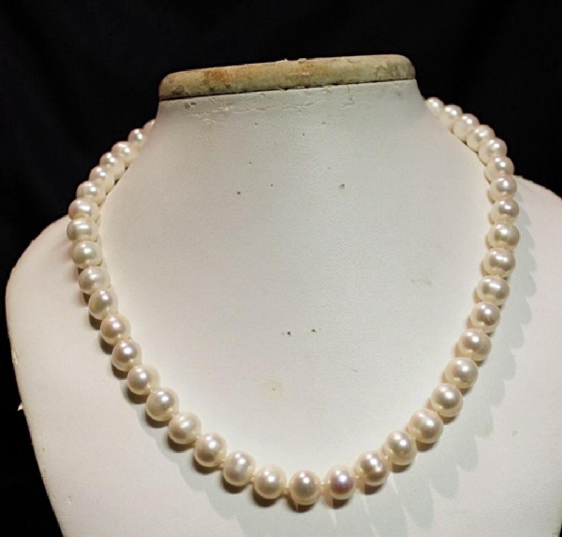 Baroque Cream Color Pearl Necklace: 16 inch single strand cream color baroque pearl necklace.