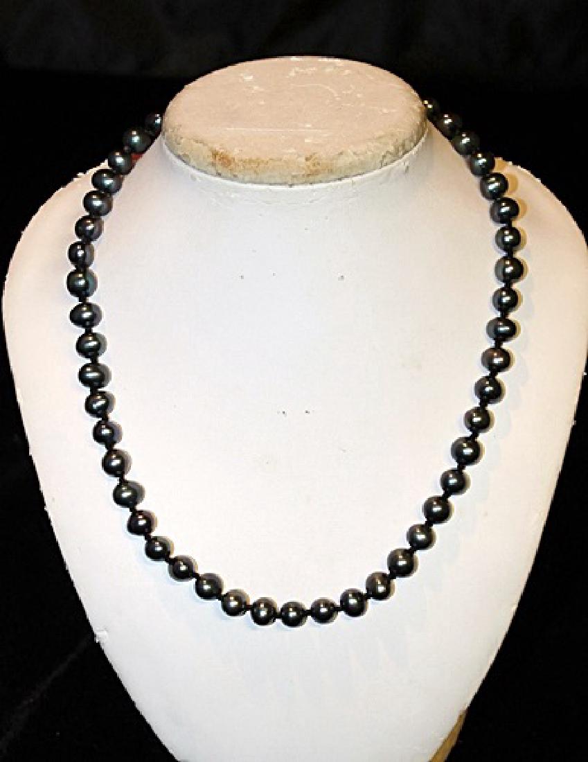 BaroqueBlack Color Pearl Necklace: 18 inch single strand black color baroque pearl necklace.