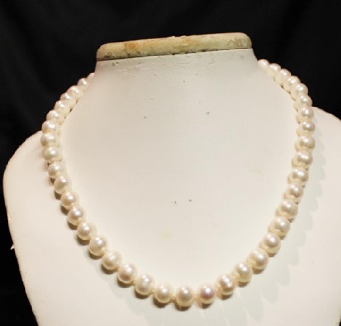 Baroque Cream Color Pearl Necklace: 16 inch single strand cream color baroque pearl necklace.