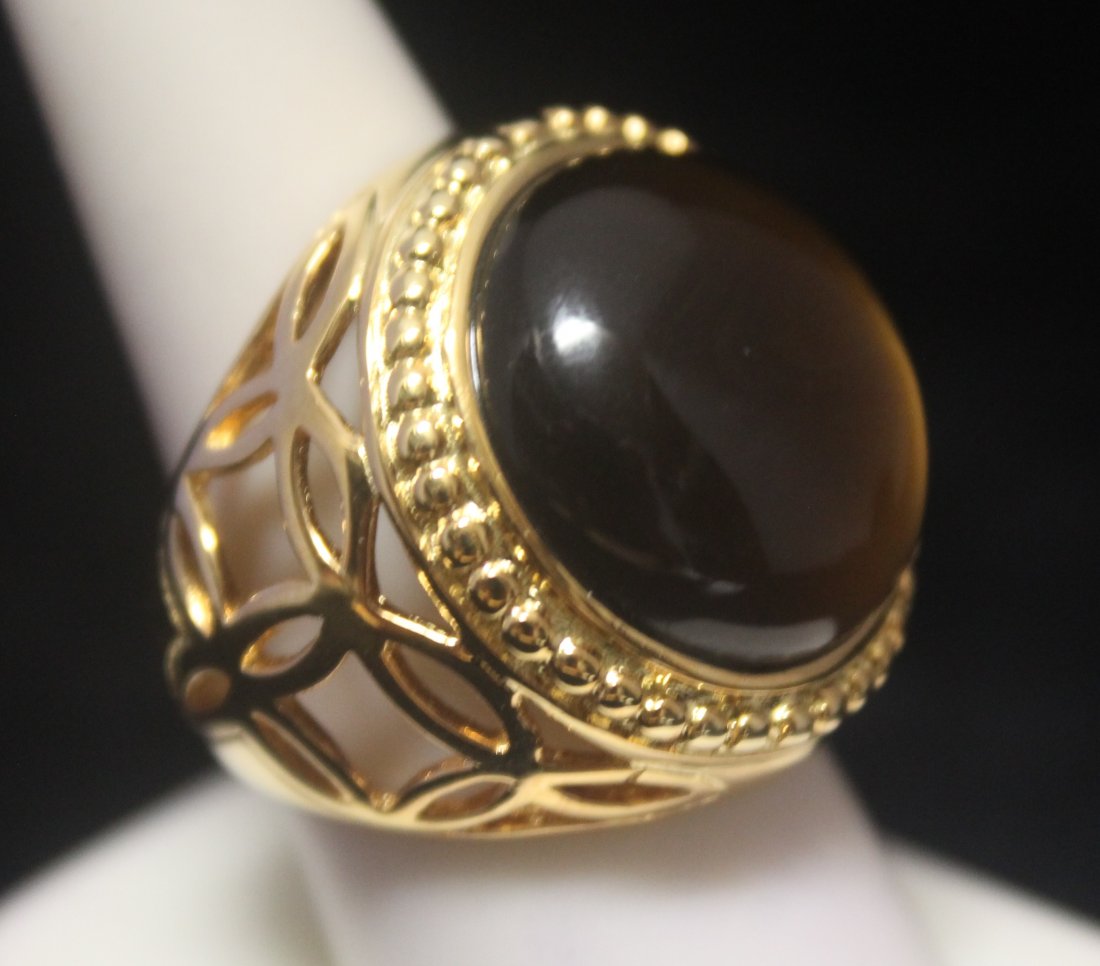 Stunning 14kt Gold over Silver Tiger Eye Ring: Stunning 14kt Gold over Silver Tiger Eye Ring; twt approx. 30cts, size approx. 8.