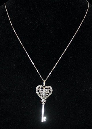 Gorgeous Silver Heart-Cross-Key Shape Necklace with: Gorgeous Silver Heart-Cross-Key Shape Necklace with Diamonds (93I) twt approx. .50ct VS1 Color I.