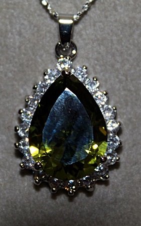 Fancy Green Peridots & White Sapphire Necklace.: Fancy Green Peridots & White Sapphire Necklace. Peridots and Sapphires approx. 10cts.