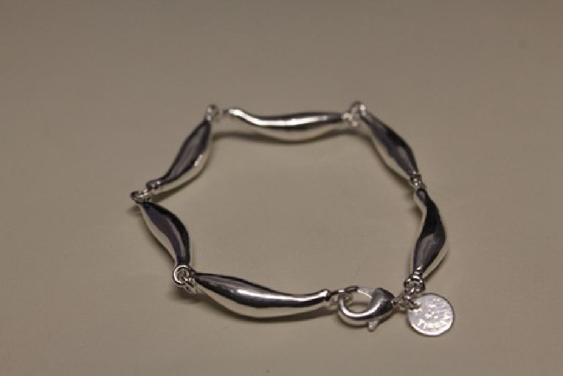 Lavish Chic Silver Bracelet (45B): Lavish Chic Silver Bracelet, size approx. 6 in.