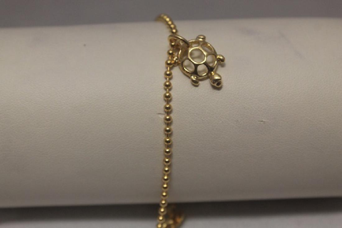 Fine 14kt Gold over Silver T & Co. Turtle Bracelet: Fine 14kt Gold over Silver T & Co. Turtle Bracelet; size approx. 8 in.