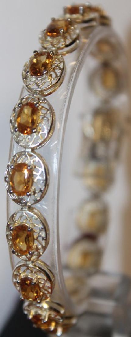 Gold Unisex Sapphire Bracelet: Unisex gold banded bracelet with sapphires, approx 30 ct.