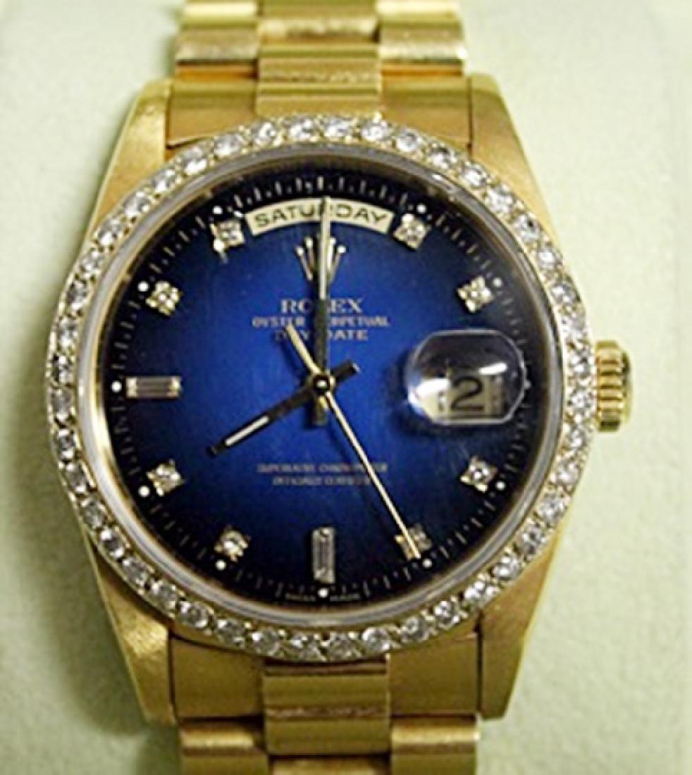 18kt President Rolex Wrist Watch: 18Kt Gold, Presidential Rolex Watch, Diamond Dial, Diamond Face, Blue Face (Sapphire), Oyster Perpetual, DayDate Rolex Wrist Watch, Comes with Papers.