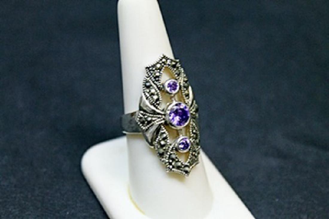 Lady's Beautiful Marcasite Tanzanite Ring (51J): Lady's Beautiful Marcasite Tanzanite Ring, Marcasite approx. 3cts, Tanzanite 3cts; 10kt white gold over silver.