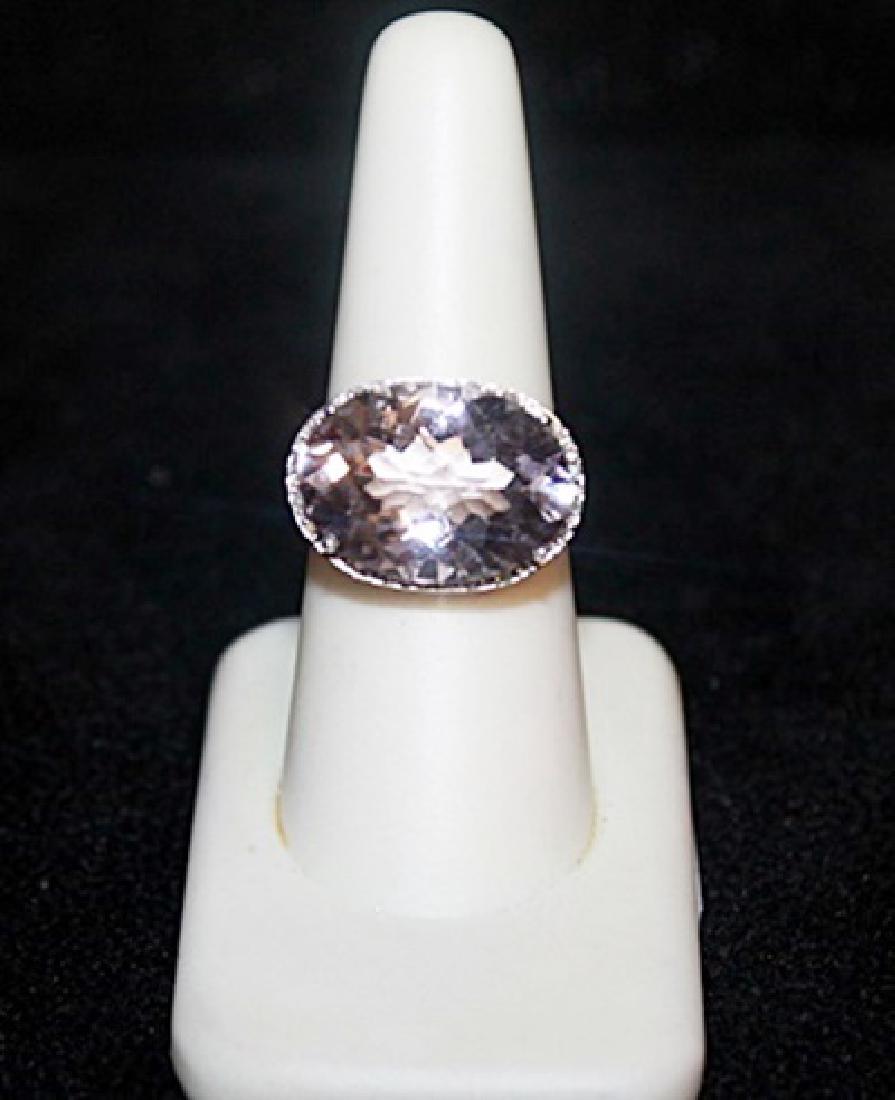 Lady' Fancy Pink-Blue Topaz with Diamond Chips Gold: Lady' Fancy Pink-Blue Topaz with Diamond Chips Gold Ring. Topaz approx. 16cts, Gold approx. 10kts.