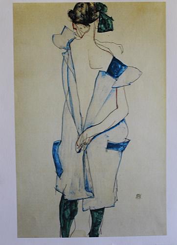 Egon Schiele Standing Girl in a Blue Dress: • Artist: Egon Schiele • Title: Standing Girl in a Blue Dress • Dimensions: Approx 14x11 inches • Medium: Lithograph "After" in our opinion a copy or after cast of work by the artist