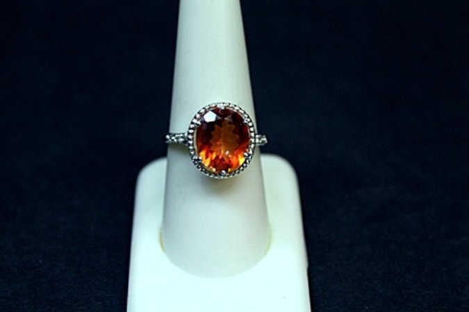 Very Unique White Gold Orange Citrine & Diamond Ring.: Very Unique 10kt White Gold over Silver; Orange Citrine & Diamond Ring. Citrine approx 8 cts., Diamonds approx .36 VS1 Color G.