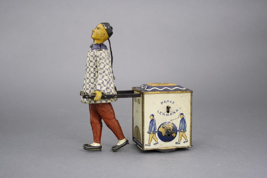 The Tea Caddy: Ernst Paul Lehmann Germany - Circa 1905 This gyroscopic operated toy works very well. Material: Tin