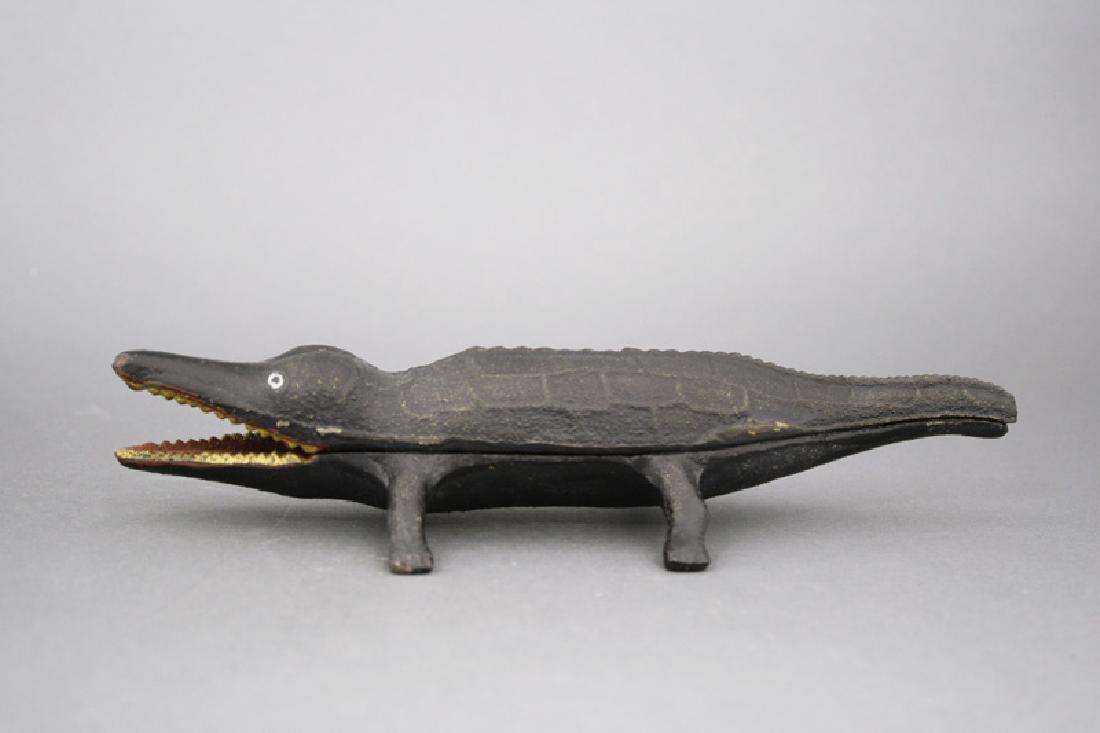 Alligator: American - Circa 1930’s - 9” Long We have never seen this bank before. It appears to have been made by some small unknown foundry. Material: Cast Iron Provenance: Ralph Dye Collection